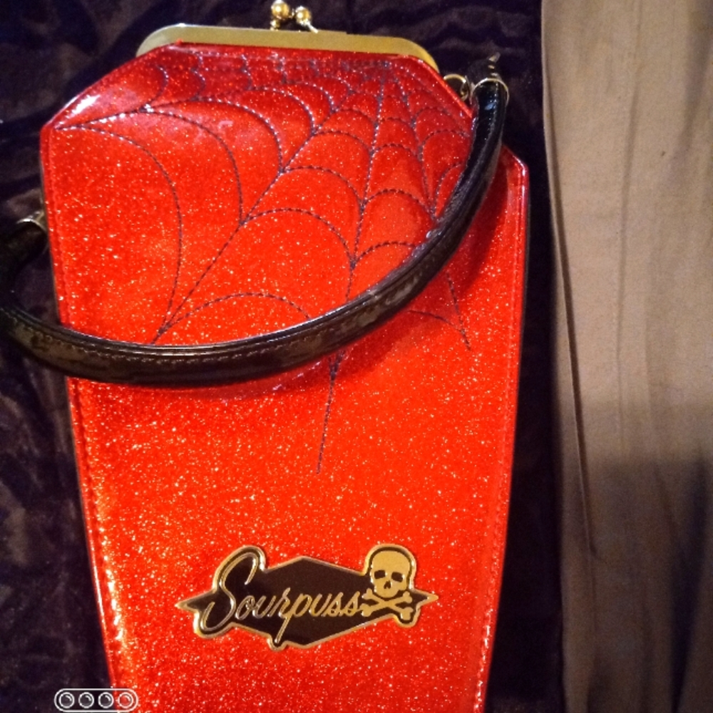 sourpuss coffin bag